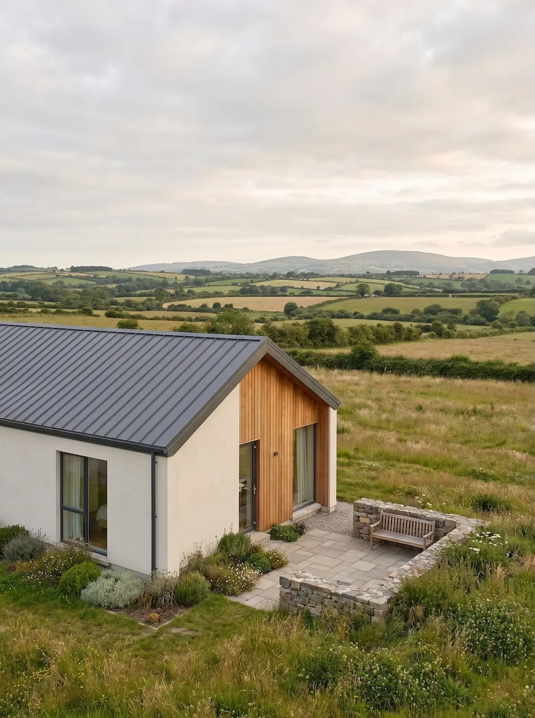 The Meadow, a calm rural modular home in open countryside.