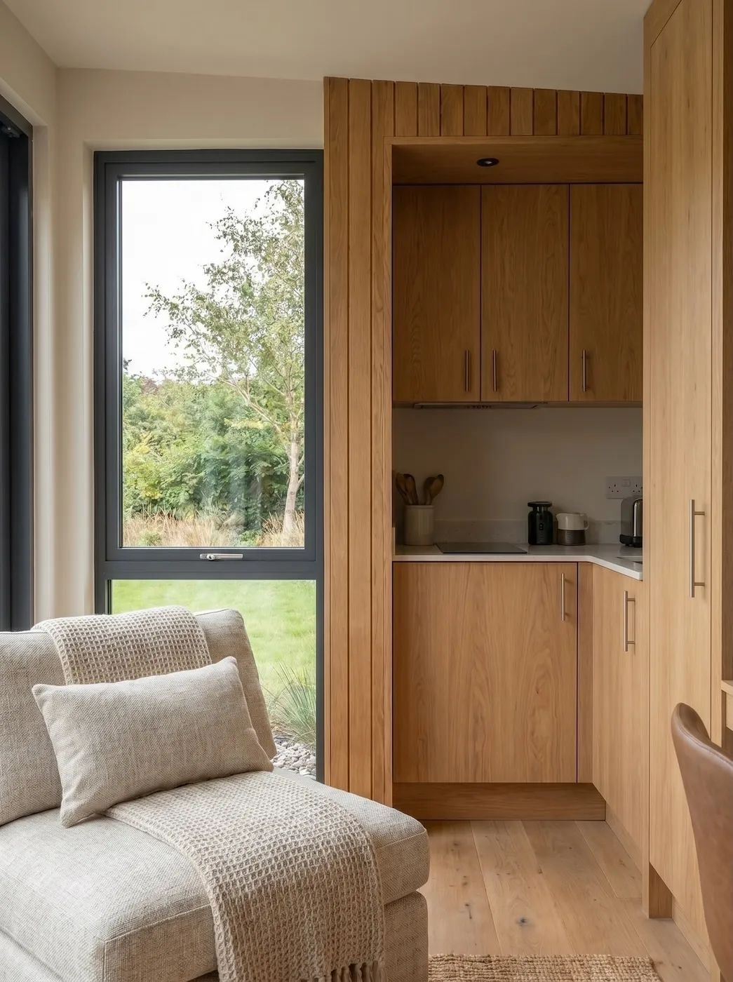 The Studio Nest kitchen, with compact storage and a clean working run.